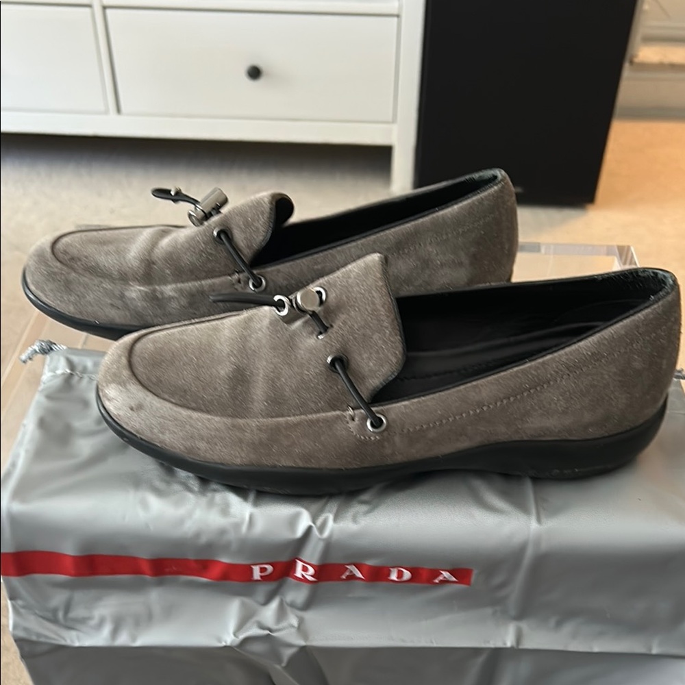 Prada Sport Gray Suede Loafers with Pull Toggle on top.